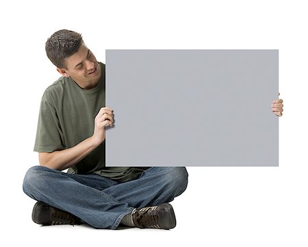 simsearch:640-01355807,k - Man holding blank sign Stock Photo - Premium Royalty-Free, Code: 640-01540416