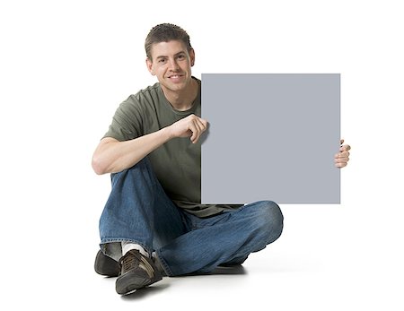 simsearch:640-01355807,k - Man holding blank sign Stock Photo - Premium Royalty-Free, Code: 640-01540417