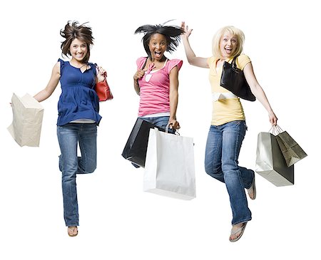 friends silhouette group - Three women jumping and smiling with shopping bags Stock Photo - Premium Royalty-Free, Code: 640-01574823