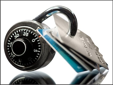 Combination lock with four bank cards Foto de stock - Royalty Free Premium, Número: 640-01575068