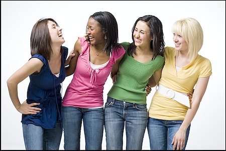 Quatre femmes s'enlaçant et souriant Photographie de stock - Premium Libres de Droits, Code: 640-01575251