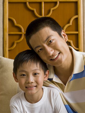simsearch:640-01601434,k - Father and son smiling Stock Photo - Premium Royalty-Free, Code: 640-01601423