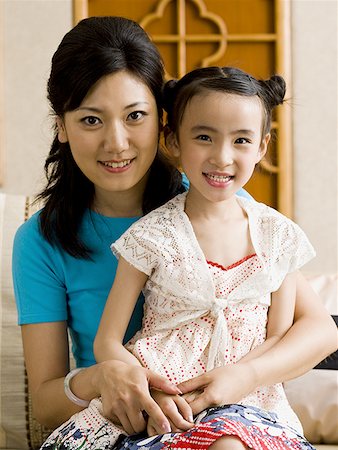 simsearch:640-01601434,k - Mother and daughter embracing and smiling Stock Photo - Premium Royalty-Free, Code: 640-01601436