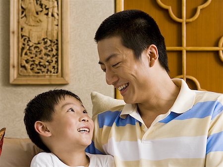 simsearch:640-01601434,k - Father and son smiling Stock Photo - Premium Royalty-Free, Code: 640-01601431