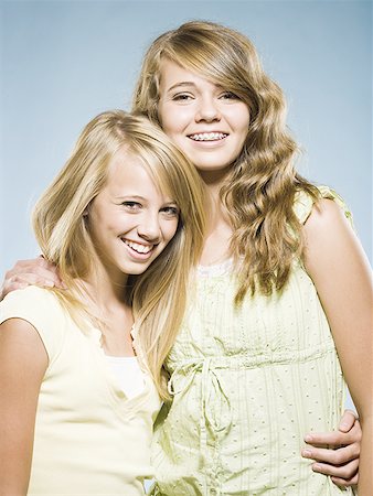 simsearch:640-01601334,k - Two girls embracing and smiling Stock Photo - Premium Royalty-Free, Code: 640-01601655