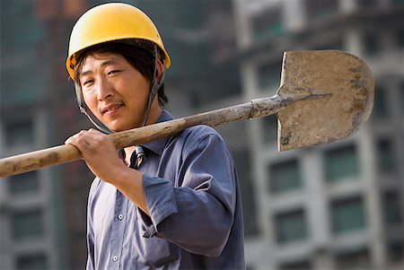 simsearch:640-03265269,k - Construction worker outdoors with helmet smiling Foto de stock - Sin royalties Premium, Código: 640-01645382