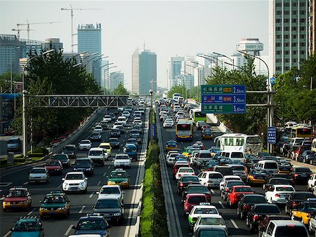 Aerial view of highway in city with traffic jam Stock Photo - Premium Royalty-Free, Code: 640-01645479