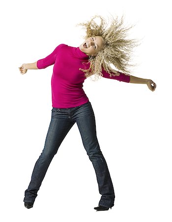 young woman dancing Stock Photo - Premium Royalty-Free, Code: 640-02655822