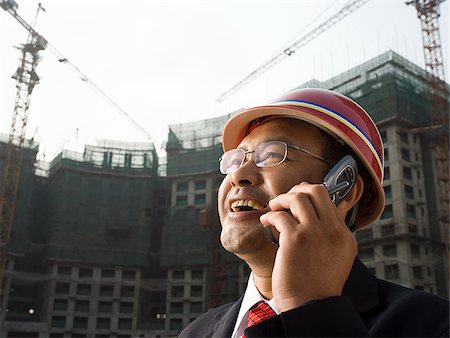 Architect on the job site. Stock Photo - Premium Royalty-Free, Code: 640-02656207