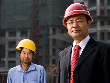 simsearch:640-02949616,k - Architect on the job site with a worker. Foto de stock - Royalty Free Premium, Número: 640-02656217