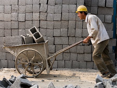 Construction worker working on the job site. Stock Photo - Premium Royalty-Free, Code: 640-02656234