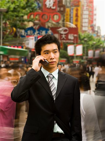 simsearch:640-02949616,k - Man with a cell phone. Foto de stock - Royalty Free Premium, Número: 640-02656300