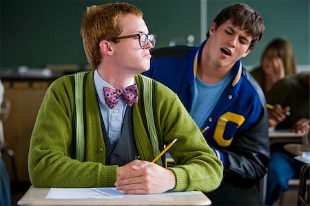 High School cheating off of a Nerd. Stock Photo - Premium Royalty-Free, Code: 640-02656584