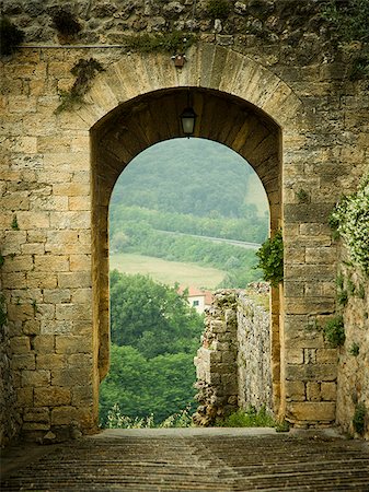 stone wall frame - Stone archway in Italy. Stock Photo - Premium Royalty-Free, Code: 640-02656825