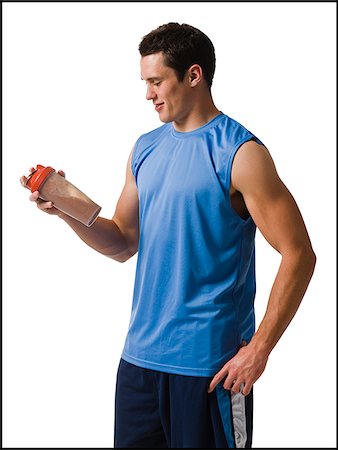 simsearch:640-02951020,k - Young man working out. Foto de stock - Royalty Free Premium, Número: 640-02657081