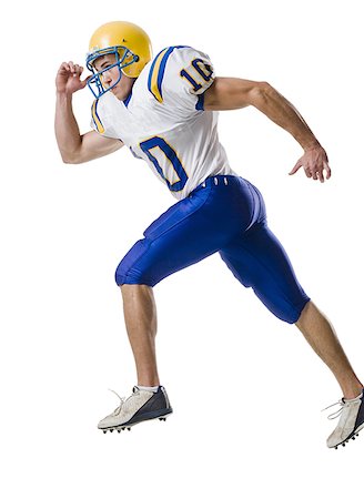 Joueur de football américain mâles jeunes. Photographie de stock - Premium Libres de Droits, Code: 640-02657102