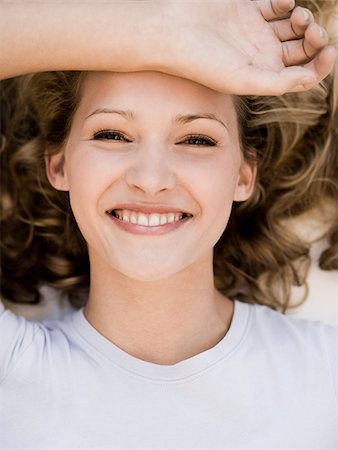 simsearch:640-02655752,k - young woman smiling. Stock Photo - Premium Royalty-Free, Code: 640-02657224