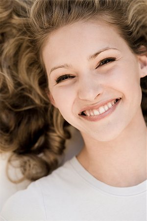 simsearch:640-02655752,k - young woman smiling. Stock Photo - Premium Royalty-Free, Code: 640-02657223