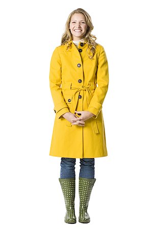 Young woman in a raincoat. Stock Photo - Premium Royalty-Free, Code: 640-02657248