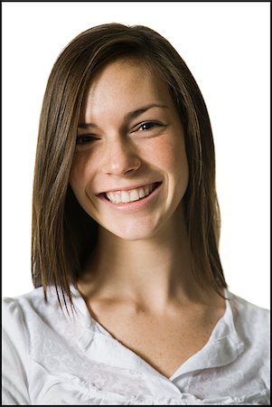 simsearch:640-02655752,k - young woman with a white shirt, smiling. Stock Photo - Premium Royalty-Free, Code: 640-02657406