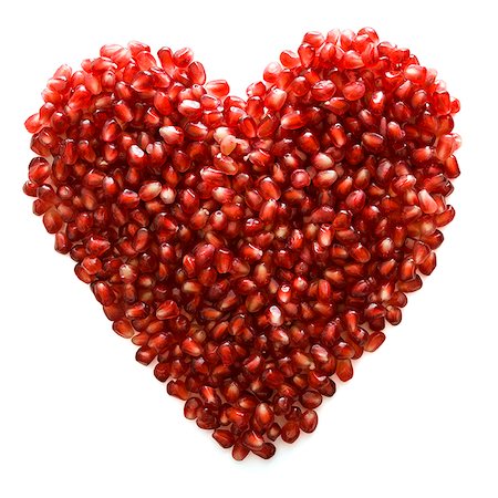 superfood - pomegranate seeds shaped into a heart Stock Photo - Premium Royalty-Free, Code: 640-02657748