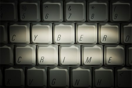 simsearch:640-02776186,k - keyboard with "cyber crime" highlighted Fotografie stock - Premium Royalty-Free, Codice: 640-02657786