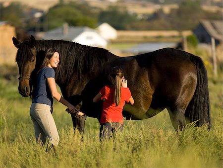 woman, girl, and a horse Foto de stock - Sin royalties Premium, Código: 640-02658215