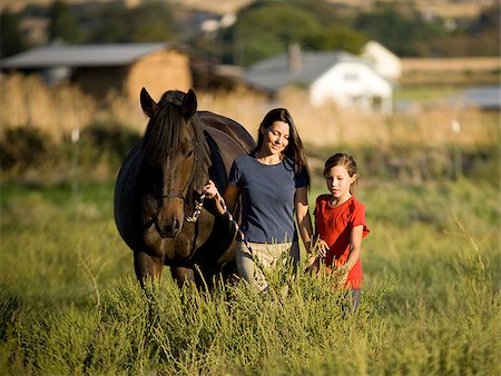 woman, girl, and a horse Foto de stock - Sin royalties Premium, Código: 640-02658213