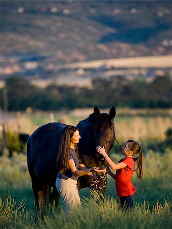 woman, girl, and a horse Foto de stock - Sin royalties Premium, Código: 640-02658222
