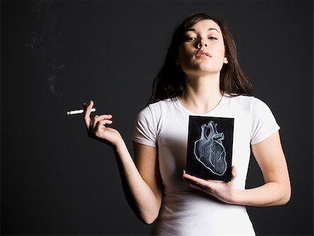 Woman smoker Stock Photo - Premium Royalty-Free, Code: 640-02658465