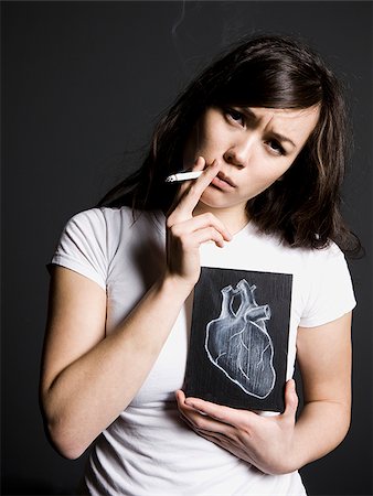 Woman smoker Stock Photo - Premium Royalty-Free, Code: 640-02658468