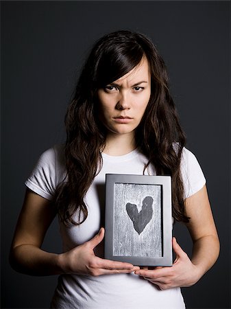 female broken heart - Sad woman Stock Photo - Premium Royalty-Free, Code: 640-02658461