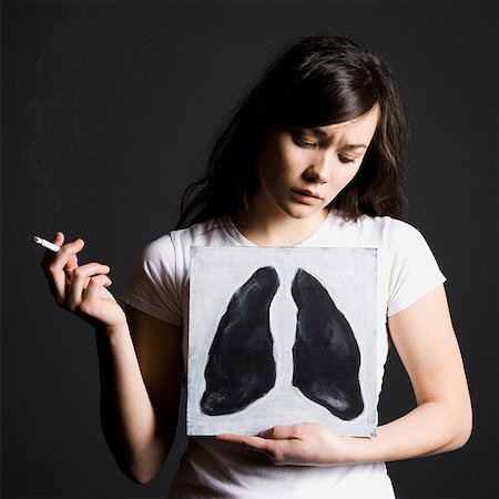 Woman smoker Stock Photo - Premium Royalty-Free, Code: 640-02658463