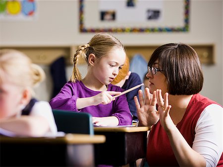 simsearch:640-02658621,k - teacher in a classroom Stock Photo - Premium Royalty-Free, Code: 640-02658643