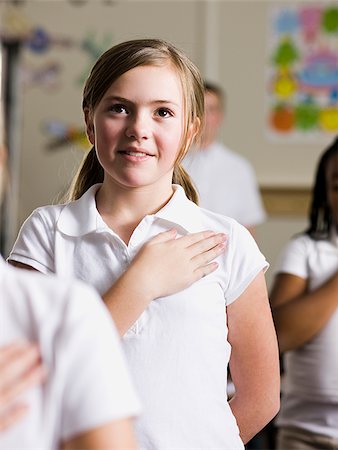 simsearch:640-02658499,k - girl saying the pledge of allegiance Stock Photo - Premium Royalty-Free, Code: 640-02658684