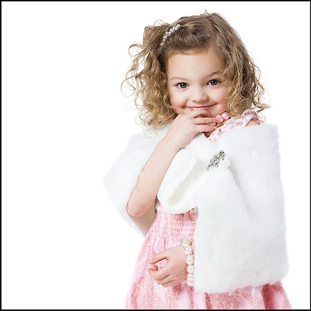 little girl playing dress up Stock Photo - Premium Royalty-Free, Code: 640-02658823