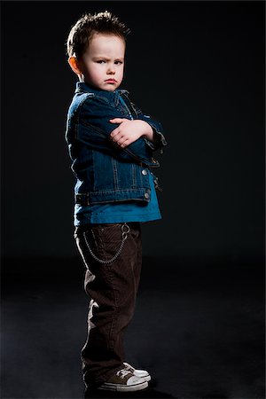 little boy in a jean jacket Stock Photo - Premium Royalty-Free, Code: 640-02658842