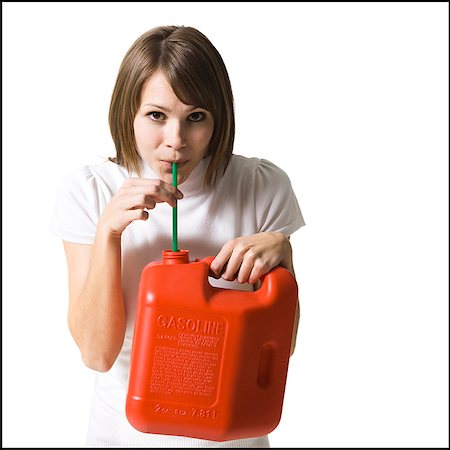 woman with a gas can Stock Photo - Premium Royalty-Free, Code: 640-02658968