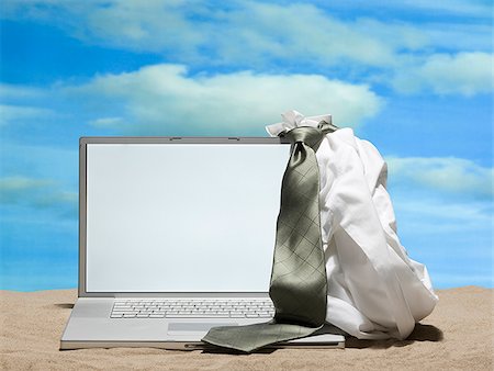 laptop in the sand Stock Photo - Premium Royalty-Free, Code: 640-02659033