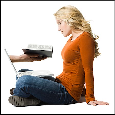 woman reading on a computer Stock Photo - Premium Royalty-Free, Code: 640-02659053