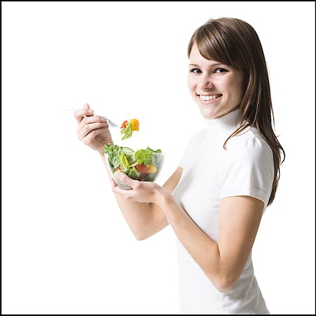 simsearch:640-02658258,k - woman eating healthily Foto de stock - Royalty Free Premium, Número: 640-02659484
