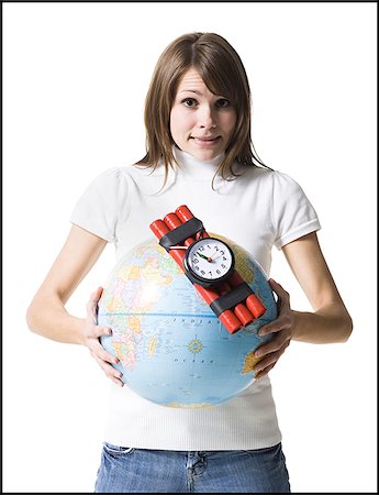 simsearch:640-02658258,k - woman holding dynamite on the earth Foto de stock - Royalty Free Premium, Número: 640-02659486