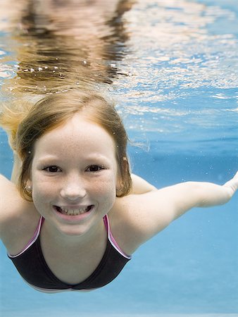 simsearch:640-02764438,k - Portrait of a girl swimming underwater Stock Photo - Premium Royalty-Free, Code: 640-02764438