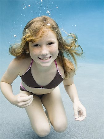 simsearch:640-02764438,k - Portrait of a girl swimming Stock Photo - Premium Royalty-Free, Code: 640-02764440