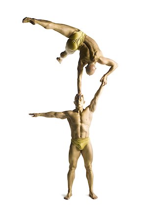 simsearch:640-01359466,k - Two male acrobats performing Stock Photo - Premium Royalty-Free, Code: 640-02764540