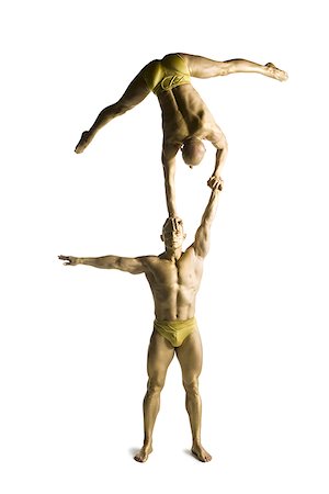simsearch:640-01359466,k - Two male acrobats performing Stock Photo - Premium Royalty-Free, Code: 640-02764541