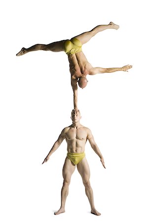 simsearch:640-02764552,k - Two male acrobats performing Foto de stock - Royalty Free Premium, Número: 640-02764562