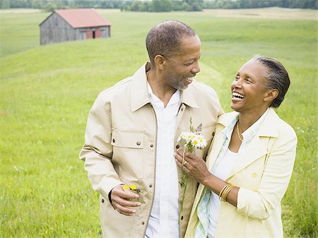 Senior man and a senior woman looking at each other Stock Photo - Premium Royalty-Free, Code: 640-02764609