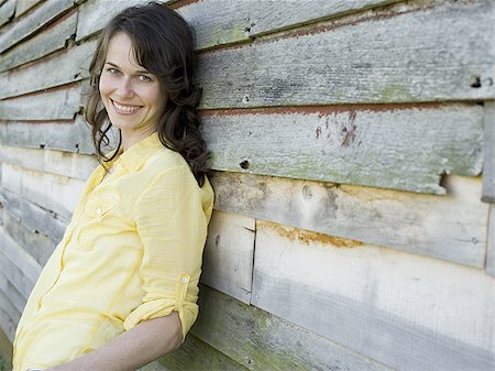 Profile of a woman smiling Stock Photo - Premium Royalty-Free, Code: 640-02764649