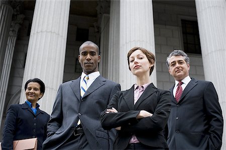 Portrait of lawyers in front of a courthouse Stock Photo - Premium Royalty-Free, Code: 640-02764719